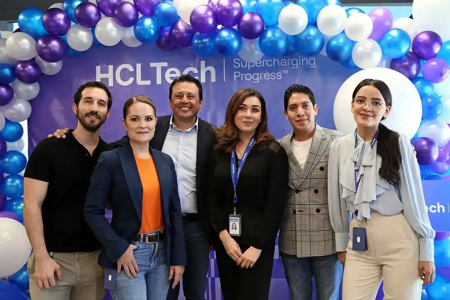 HCLTechies posing during rebranding celebration
